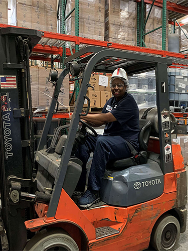 DDW associate driving a fork lift showing available job opportunities